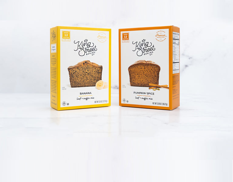 Two boxes of King Street Baking Co loaf mixes on a white marble background.