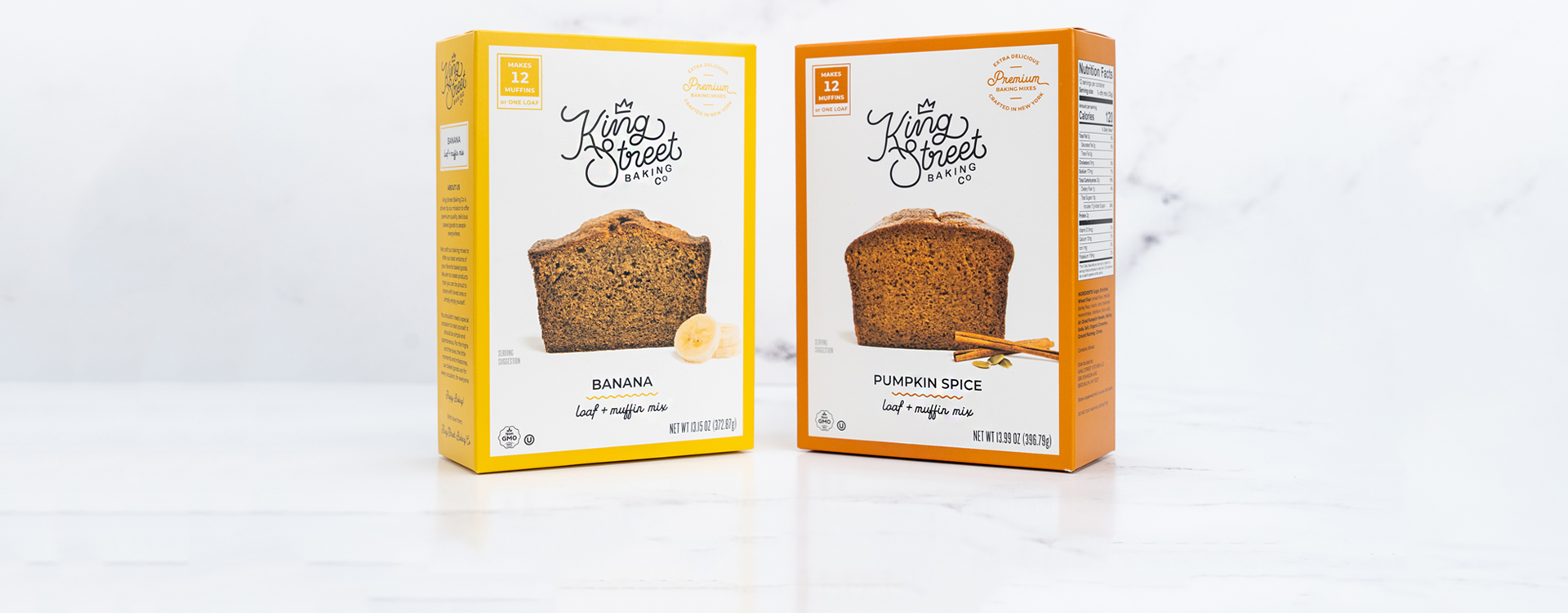 Two boxes of King Street Baking Co loaf mixes on a white marble background.